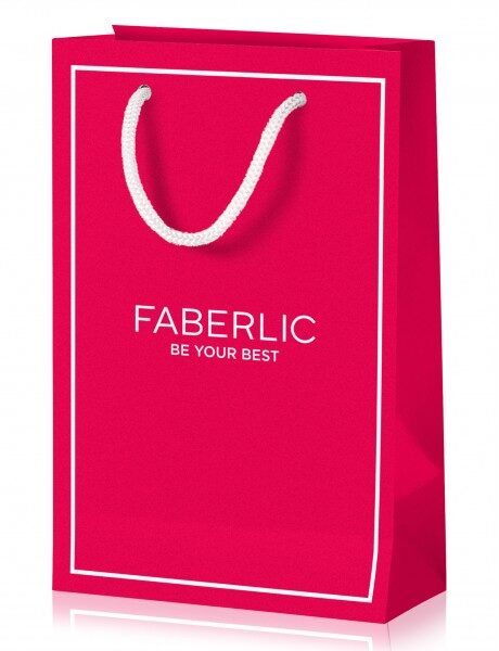 Купить Розовая бумажная сумка с белыми ручками и логотипом Faberlic на передней стороне. из каталога Фаберлик.